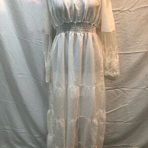 White off the shoulder long dress for bride or any woman.